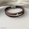 Lederarmband mit kleinem Stern in navy und cognac