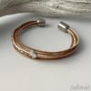 das Lederarmband Ginkgoblatt in Bronze-weiss