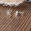 die Ohrstecker Miniherzchen in silber