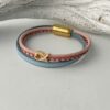 Armband mit Fisch in Gold hellblau-rosa