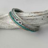 Lederarmband mit Infinity türkis beige