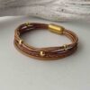 Lederarmband aus Nappa in Gold und braun