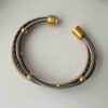 Lederarmband aus Nappa mit Gold in grau und beige