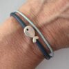 niedliches Armband mit einem Fischchen zur Kommunion